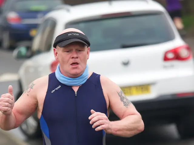 Individual spotted in swimwear jogging along an unpaved path adjacent to the A61 highway
