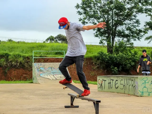 In this image in the center there is one person who is skating, and in the background there are...